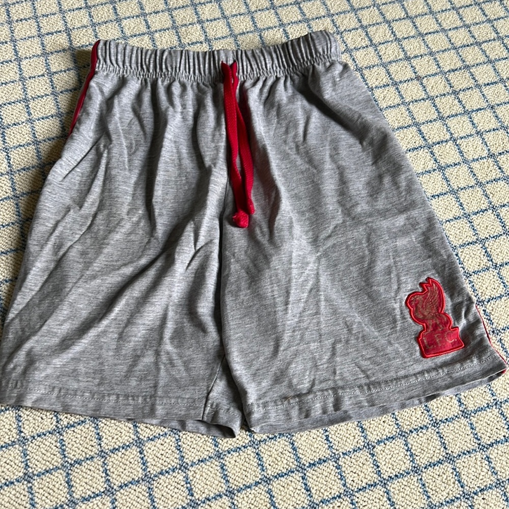 Liverpool F.C. Shorts. Elastic waist with drawstring.